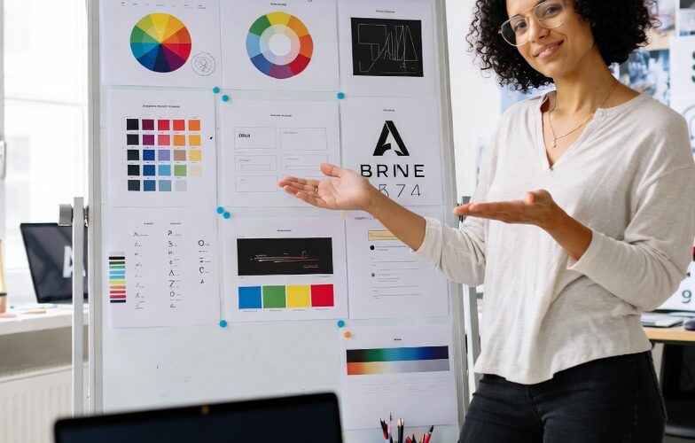 Graphic designer reviewing brand identity work after completing an online design course